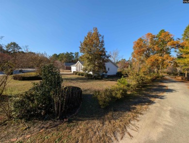 Welcome to this charming single-family home in Columbia, SC! on The Woodlands Country Club in South Carolina - for sale on GolfHomes.com, golf home, golf lot