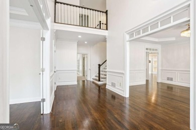 Discover an extraordinary 8,999 square foot sanctuary perfect on Brookstone Golf and Country Club in Georgia - for sale on GolfHomes.com, golf home, golf lot