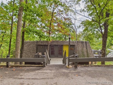 Stunning 4-Bedroom Home with Seasonal Lake Views & Strong Rental on The Oaks Golf Course in Missouri - for sale on GolfHomes.com, golf home, golf lot
