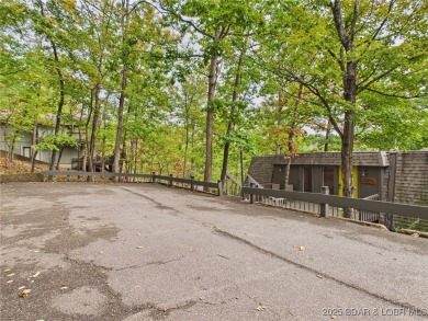 Stunning 4-Bedroom Home with Seasonal Lake Views & Strong Rental on The Oaks Golf Course in Missouri - for sale on GolfHomes.com, golf home, golf lot