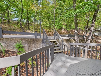 Stunning 4-Bedroom Home with Seasonal Lake Views & Strong Rental on The Oaks Golf Course in Missouri - for sale on GolfHomes.com, golf home, golf lot