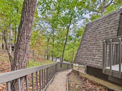 Stunning 4-Bedroom Home with Seasonal Lake Views & Strong Rental on The Oaks Golf Course in Missouri - for sale on GolfHomes.com, golf home, golf lot