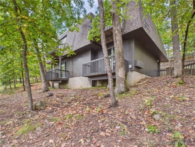 Stunning 4-Bedroom Home with Seasonal Lake Views & Strong Rental on The Oaks Golf Course in Missouri - for sale on GolfHomes.com, golf home, golf lot
