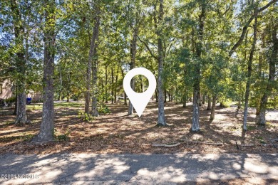 Perfect location to build your coastal home.  Level lot with on Oyster Bay Golf Links in North Carolina - for sale on GolfHomes.com, golf home, golf lot