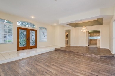 Welcome to this spacious three-bedroom on East Lake Woodlands Country Club in Florida - for sale on GolfHomes.com, golf home, golf lot