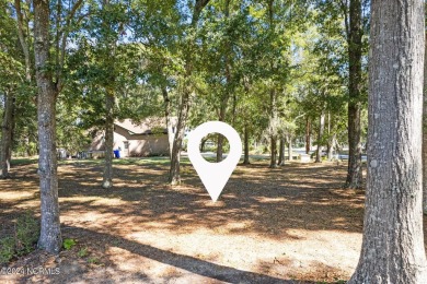 Perfect location to build your coastal home.  Level lot with on Oyster Bay Golf Links in North Carolina - for sale on GolfHomes.com, golf home, golf lot