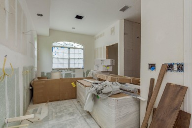 Welcome to this spacious three-bedroom on East Lake Woodlands Country Club in Florida - for sale on GolfHomes.com, golf home, golf lot