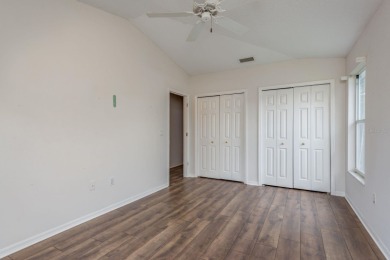 Welcome to this spacious three-bedroom on East Lake Woodlands Country Club in Florida - for sale on GolfHomes.com, golf home, golf lot