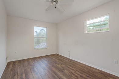 Welcome to this spacious three-bedroom on East Lake Woodlands Country Club in Florida - for sale on GolfHomes.com, golf home, golf lot
