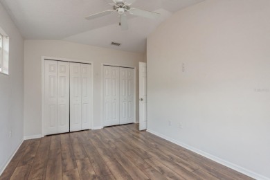 Welcome to this spacious three-bedroom on East Lake Woodlands Country Club in Florida - for sale on GolfHomes.com, golf home, golf lot