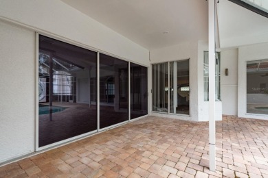 Welcome to this spacious three-bedroom on East Lake Woodlands Country Club in Florida - for sale on GolfHomes.com, golf home, golf lot