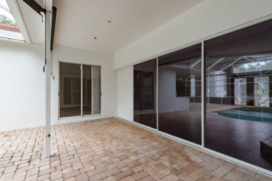 Welcome to this spacious three-bedroom on East Lake Woodlands Country Club in Florida - for sale on GolfHomes.com, golf home, golf lot