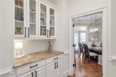 Southern-Inspired Cape Cod Estate on the 15th Hole in Gated on Alpharetta Athletic Club East in Georgia - for sale on GolfHomes.com, golf home, golf lot