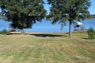 ABSOLUTELY BREATHTAKING VIEWS AND SUNSETS FROM THIS BEAUTIFUL on Cedar Creek Country Club in Texas - for sale on GolfHomes.com, golf home, golf lot