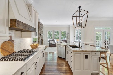 Southern-Inspired Cape Cod Estate on the 15th Hole in Gated on Alpharetta Athletic Club East in Georgia - for sale on GolfHomes.com, golf home, golf lot