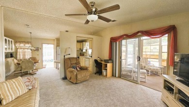 Welcome to your cozy retreat in the sought-after Golf Course on Blue Heron Pines Golf Course in Florida - for sale on GolfHomes.com, golf home, golf lot