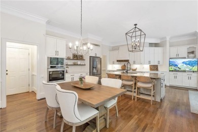 Southern-Inspired Cape Cod Estate on the 15th Hole in Gated on Alpharetta Athletic Club East in Georgia - for sale on GolfHomes.com, golf home, golf lot