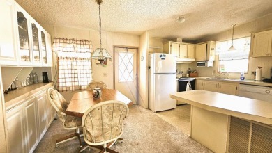 Welcome to your cozy retreat in the sought-after Golf Course on Blue Heron Pines Golf Course in Florida - for sale on GolfHomes.com, golf home, golf lot