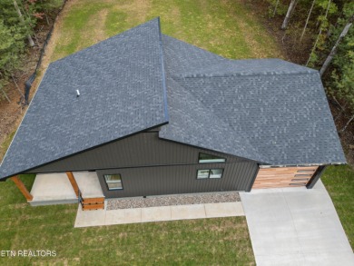 Beautiful new construction home situated on a level lot in the on Lake Tansi Village Country Club in Tennessee - for sale on GolfHomes.com, golf home, golf lot