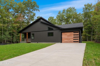 Beautiful new construction home situated on a level lot in the on Lake Tansi Village Country Club in Tennessee - for sale on GolfHomes.com, golf home, golf lot
