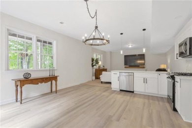 Southern-Inspired Cape Cod Estate on the 15th Hole in Gated on Alpharetta Athletic Club East in Georgia - for sale on GolfHomes.com, golf home, golf lot