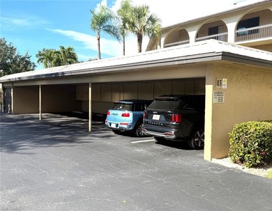 What a nice unit. The building and grounds are spotless!  Common on Hibiscus Golf Club in Florida - for sale on GolfHomes.com, golf home, golf lot