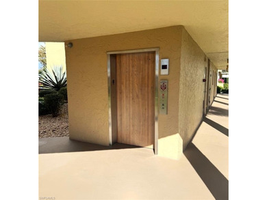 What a nice unit. The building and grounds are spotless!  Common on Hibiscus Golf Club in Florida - for sale on GolfHomes.com, golf home, golf lot