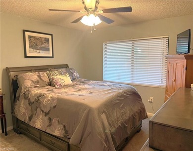 What a nice unit. The building and grounds are spotless!  Common on Hibiscus Golf Club in Florida - for sale on GolfHomes.com, golf home, golf lot