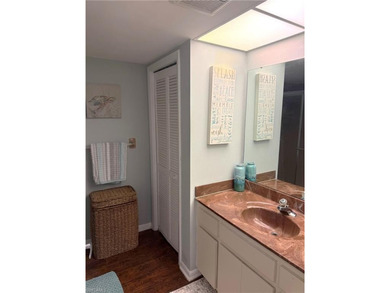 What a nice unit. The building and grounds are spotless!  Common on Hibiscus Golf Club in Florida - for sale on GolfHomes.com, golf home, golf lot