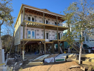 Discover Your Coastal Retreat on Oak Island's SE 75th Street on Founders Club At St. James Plantation in North Carolina - for sale on GolfHomes.com, golf home, golf lot