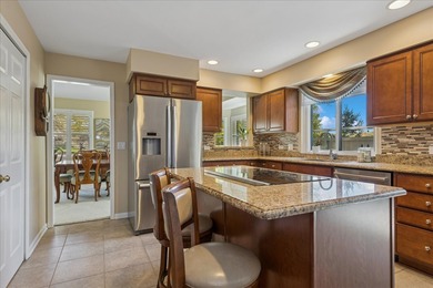 Fabulous expanded Augusta end-unit townhome in the premier on Pine Meadow Golf Club in Illinois - for sale on GolfHomes.com, golf home, golf lot