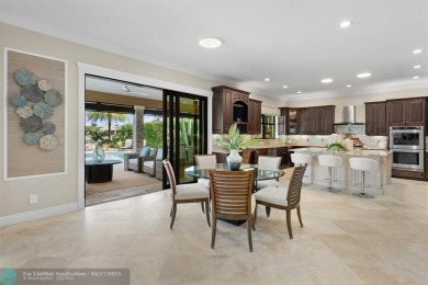 Experience resort style living in this lakefront Parkland Golf & on Parkland Golf Club in Florida - for sale on GolfHomes.com, golf home, golf lot