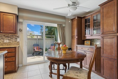 Fabulous expanded Augusta end-unit townhome in the premier on Pine Meadow Golf Club in Illinois - for sale on GolfHomes.com, golf home, golf lot