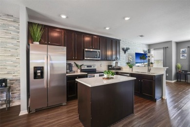 Welcome home! This charming coastal retreat home features 2 on Gulf Harbors Golf Course in Florida - for sale on GolfHomes.com, golf home, golf lot