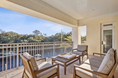 Beautifully FURNISHED 2 bedroom 2 1/2 bath condominium with 50' on Pablo Creek Club in Florida - for sale on GolfHomes.com, golf home, golf lot