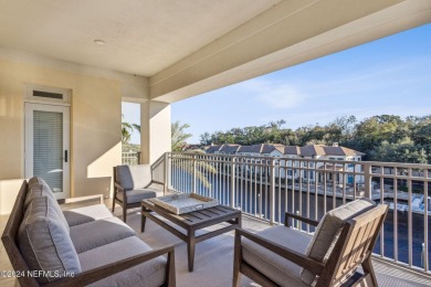 Beautifully FURNISHED 2 bedroom 2 1/2 bath condominium with 50' on Pablo Creek Club in Florida - for sale on GolfHomes.com, golf home, golf lot