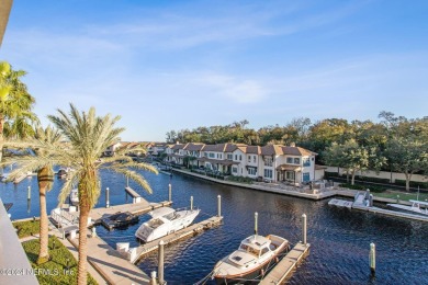 Beautifully FURNISHED 2 bedroom 2 1/2 bath condominium with 50' on Pablo Creek Club in Florida - for sale on GolfHomes.com, golf home, golf lot