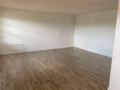Stunning 2 bed, 2 bath fully updated condo with beautiful lake on Flamingo Lakes Country Club in Florida - for sale on GolfHomes.com, golf home, golf lot