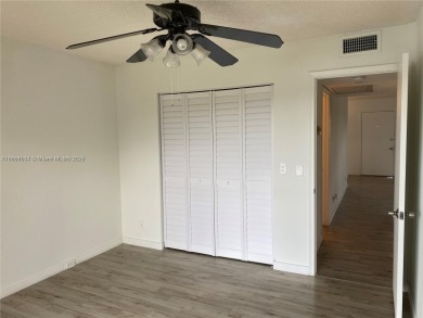 Stunning 2 bed, 2 bath fully updated condo with beautiful lake on Flamingo Lakes Country Club in Florida - for sale on GolfHomes.com, golf home, golf lot