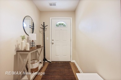 Completely Redone in 2023! This stunning first-floor, end unit on Swan Valley Golf Club in Michigan - for sale on GolfHomes.com, golf home, golf lot