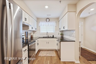 Completely Redone in 2023! This stunning first-floor, end unit on Swan Valley Golf Club in Michigan - for sale on GolfHomes.com, golf home, golf lot