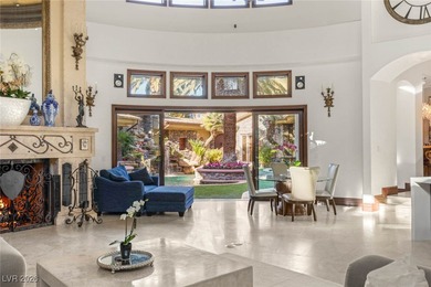 Timeless single-story custom estate with basement, offering 7 on Dragon Ridge Country Club in Nevada - for sale on GolfHomes.com, golf home, golf lot