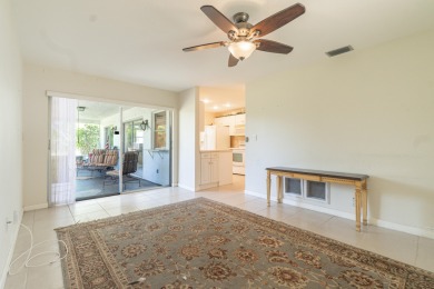 Oversized .21-acre lot with canal access--fish from your on Leisureville Community Golf Course in Florida - for sale on GolfHomes.com, golf home, golf lot
