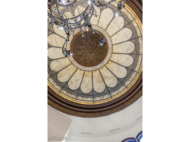 Timeless single-story custom estate with basement, offering 7 on Dragon Ridge Country Club in Nevada - for sale on GolfHomes.com, golf home, golf lot