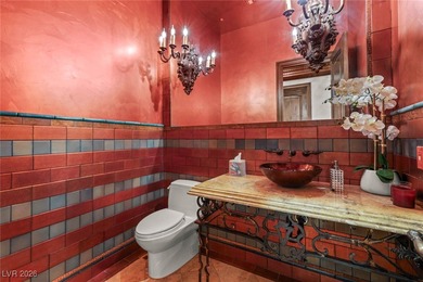 Timeless single-story custom estate with basement, offering 7 on Dragon Ridge Country Club in Nevada - for sale on GolfHomes.com, golf home, golf lot