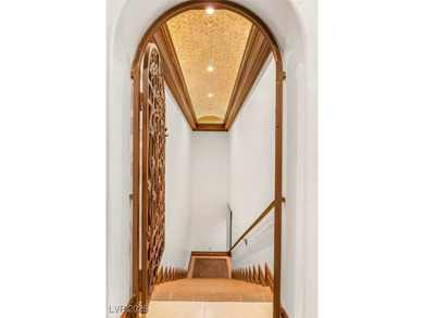 Timeless single-story custom estate with basement, offering 7 on Dragon Ridge Country Club in Nevada - for sale on GolfHomes.com, golf home, golf lot