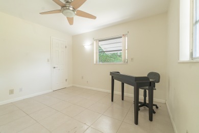Oversized .21-acre lot with canal access--fish from your on Leisureville Community Golf Course in Florida - for sale on GolfHomes.com, golf home, golf lot