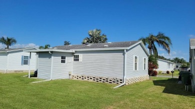 Retire in Style and Relax in Comfort in this Charming Home! on Cypresswood Golf and Country Club in Florida - for sale on GolfHomes.com, golf home, golf lot