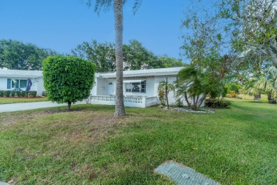 Oversized .21-acre lot with canal access--fish from your on Leisureville Community Golf Course in Florida - for sale on GolfHomes.com, golf home, golf lot