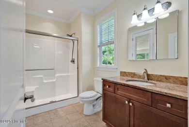 A Coastal home on over a half-acre, built by Fogelman & on Cape Fear National At Brunswick Forest in North Carolina - for sale on GolfHomes.com, golf home, golf lot